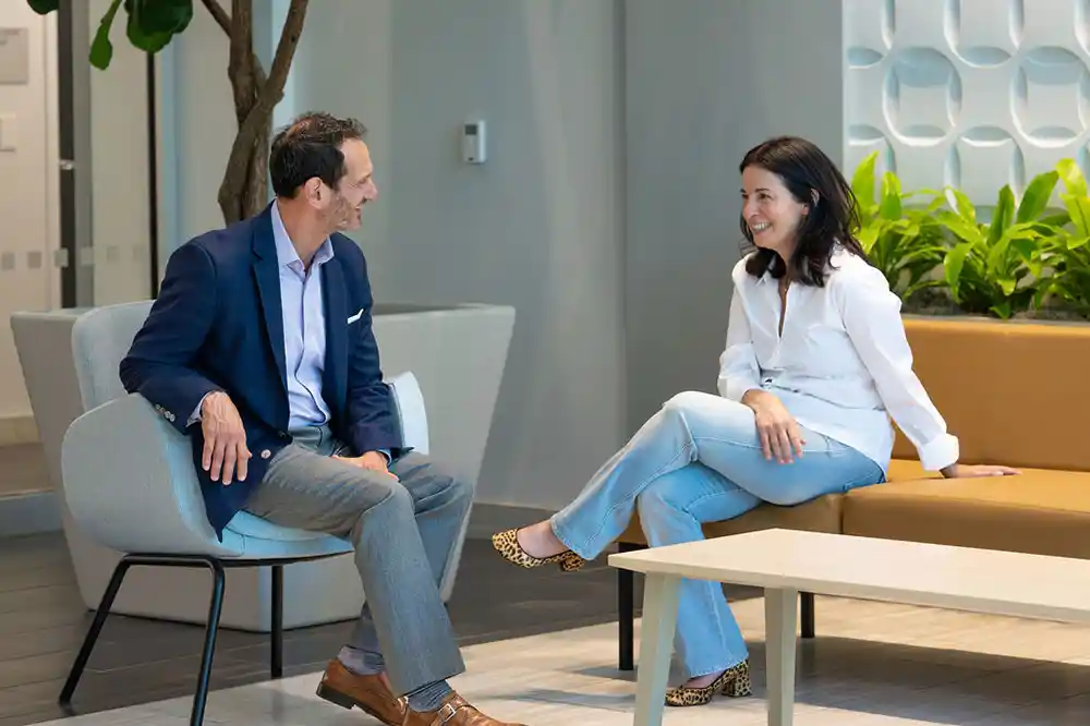 People talking in building lobby